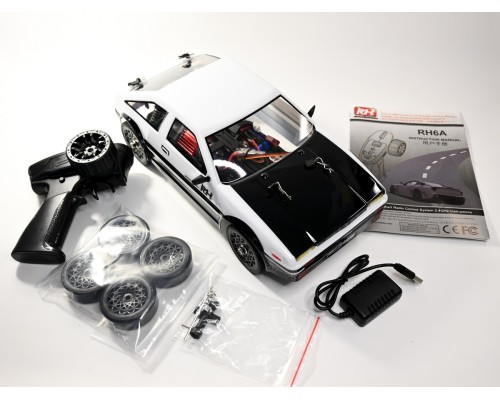Радиоуправляемая машина для дрифта Remo Hobby RACING & DRIFT (бело-черная) 4WD 2.4G 1/14 RTR RH1411-TWB в Красноярске Радиоуправляемая машина для дрифта Remo Hobby RACING & DRIFT (бело-черная) 4WD 2.4G 1/14 RTR RH1411-TWB в Красноярске
